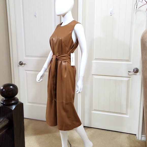 Calvin Klein Dresses & Skirts - HOST PICK😍 Calvin klein faux leather dress NWT (Necklace NOT included).